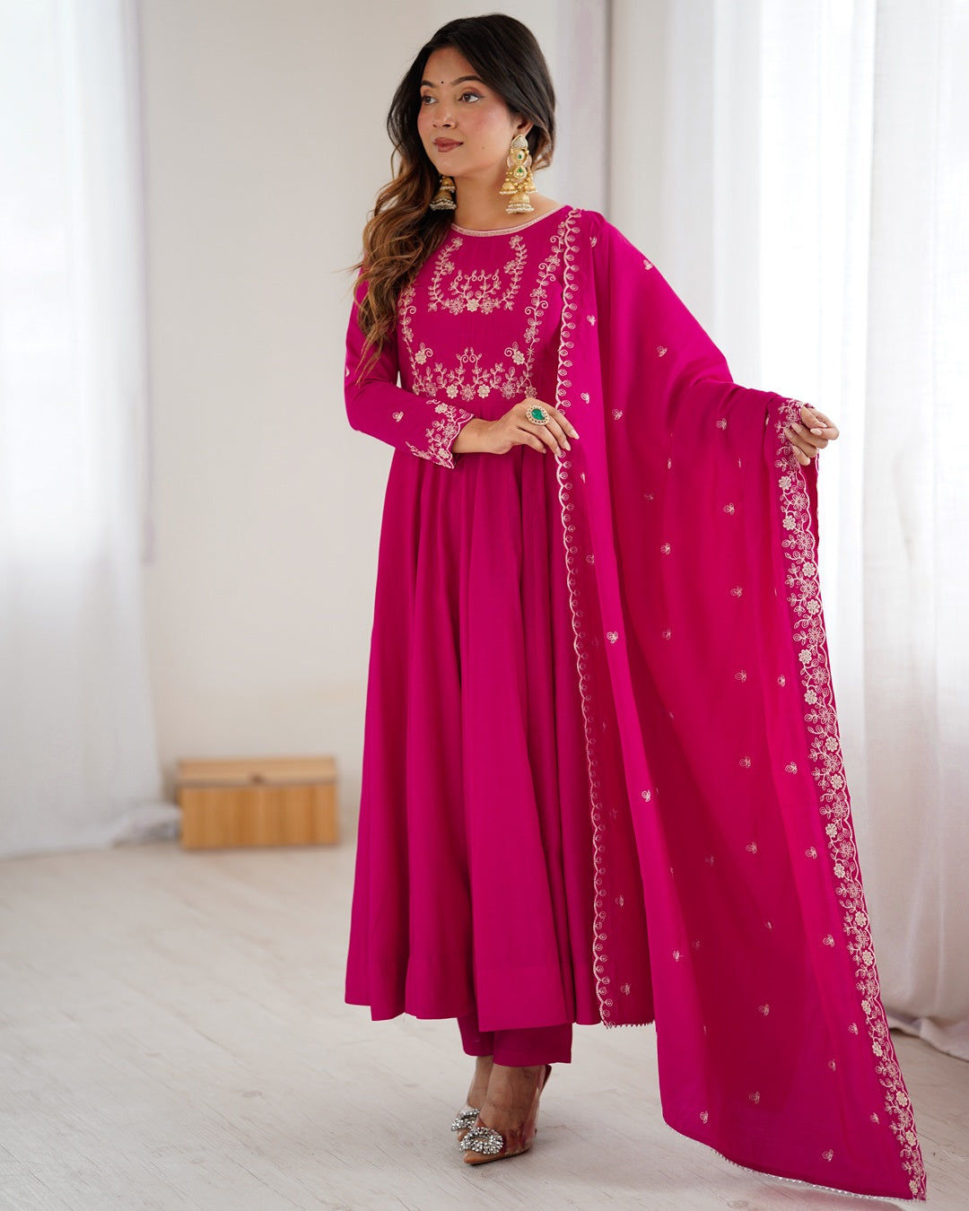Rani pink Chanderi silk three-piece Anarkali suit with elegant flare and rich finish—perfect for weddings and festive occasions.