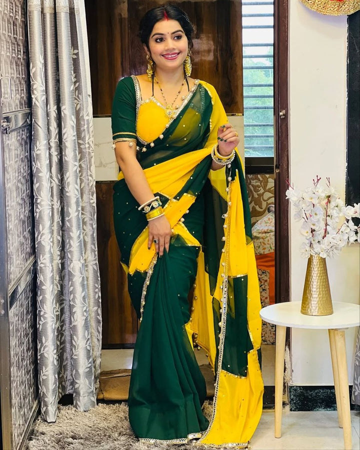 Green & Yellow georgette saree with box design, mirror work & gotta lace border – perfect for festive wear.