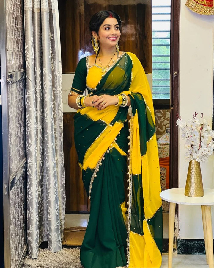 Green & Yellow georgette saree with box design, mirror work & gotta lace border – perfect for festive wear.