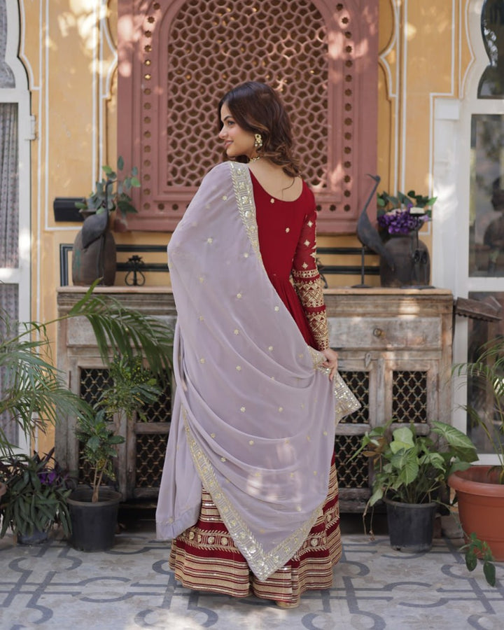 Rusty Red Color Faux Blooming Zari Embroidered Work Gown