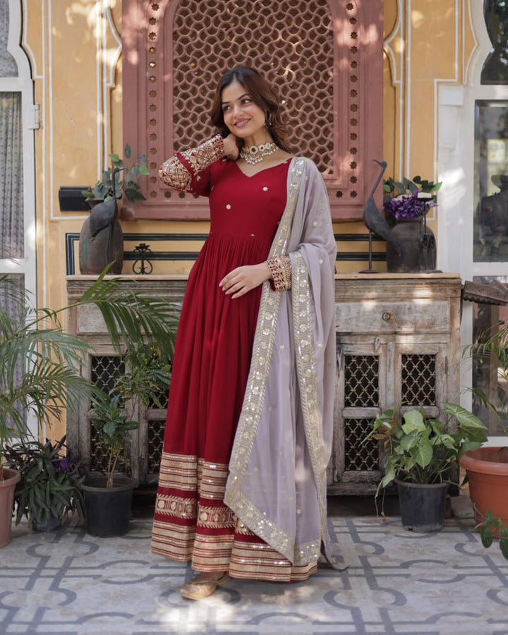 Rusty Red Color Faux Blooming Zari Embroidered Work Gown