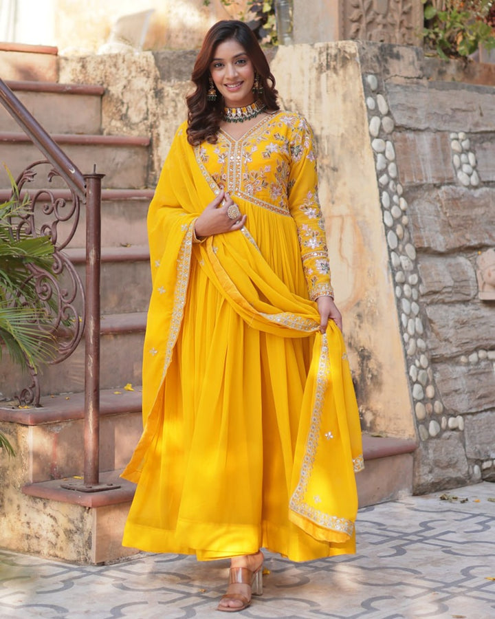 Mustard Color Faux Blooming Zari Embroidered Work Gown