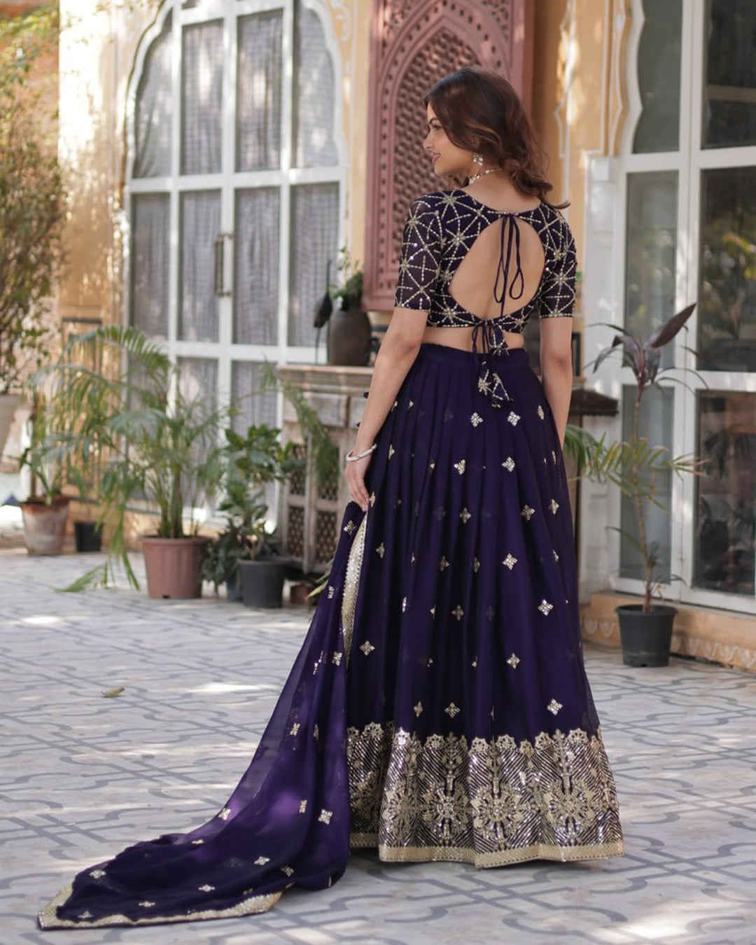 Dark Purple Color Rangoli Silk Embroidered Lehenga Choli