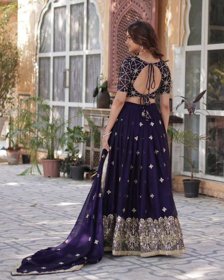 Dark Purple Color Rangoli Silk Embroidered Lehenga Choli
