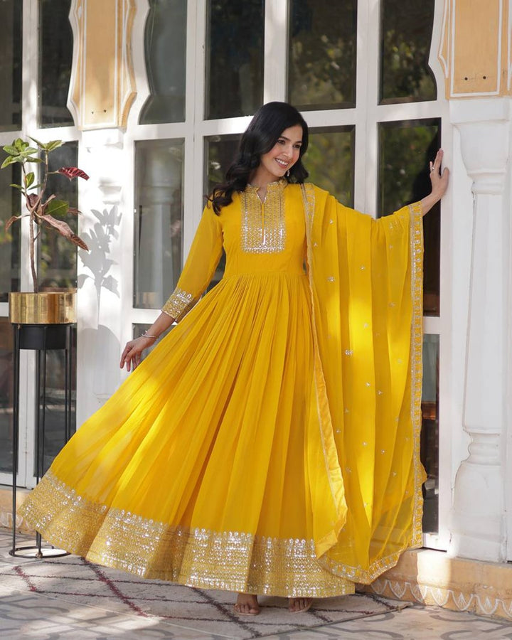 Yellow Color Faux Blooming Rich Embroidered Work Gown
