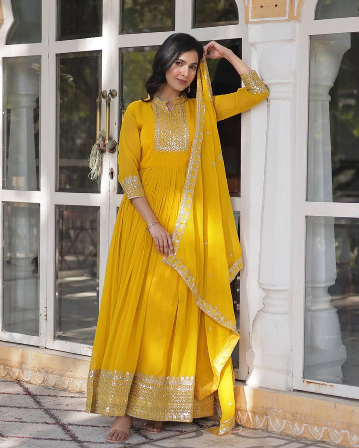 Yellow Color Faux Blooming Rich Embroidered Work Gown