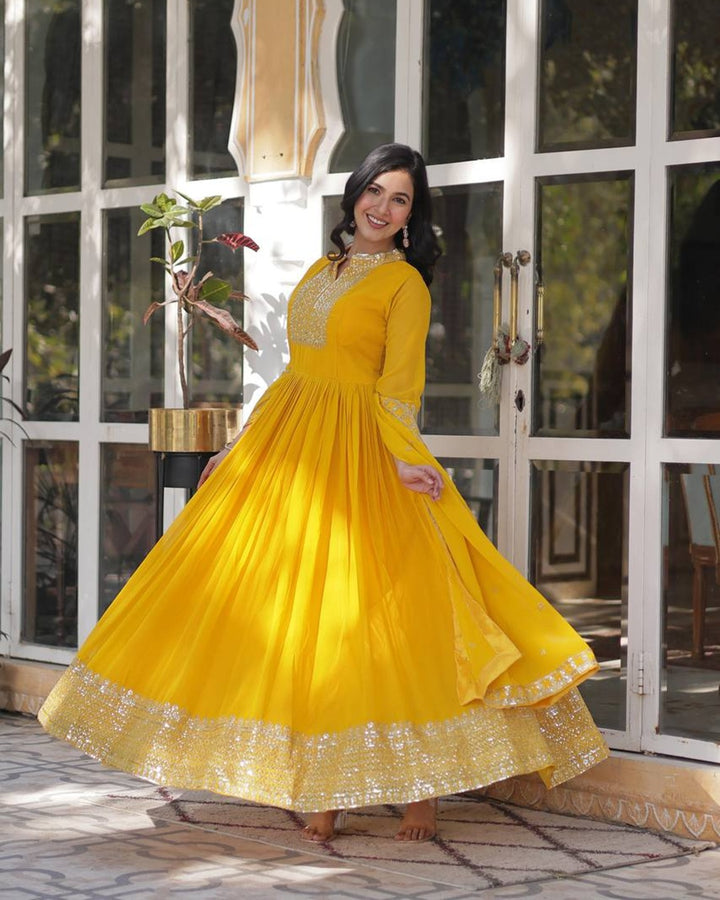 Yellow Color Faux Blooming Rich Embroidered Work Gown