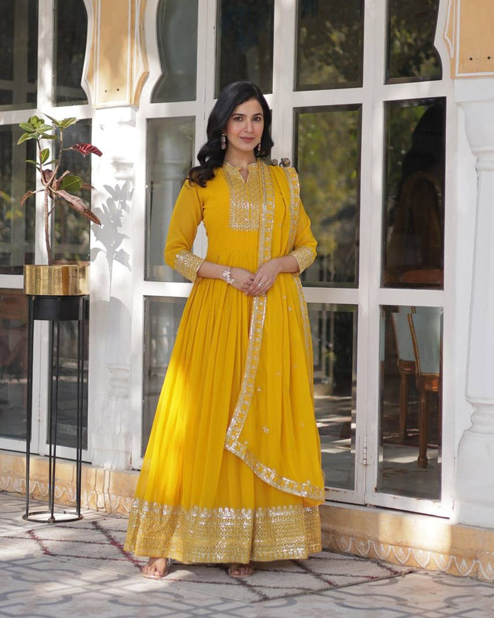Yellow Color Faux Blooming Rich Embroidered Work Gown