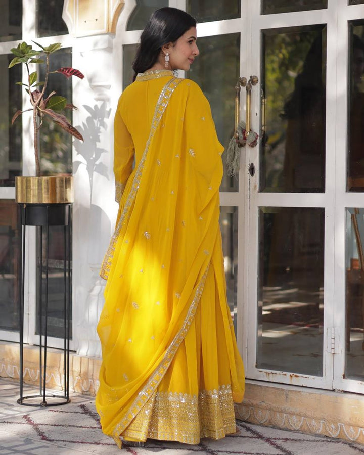 Yellow Color Faux Blooming Rich Embroidered Work Gown