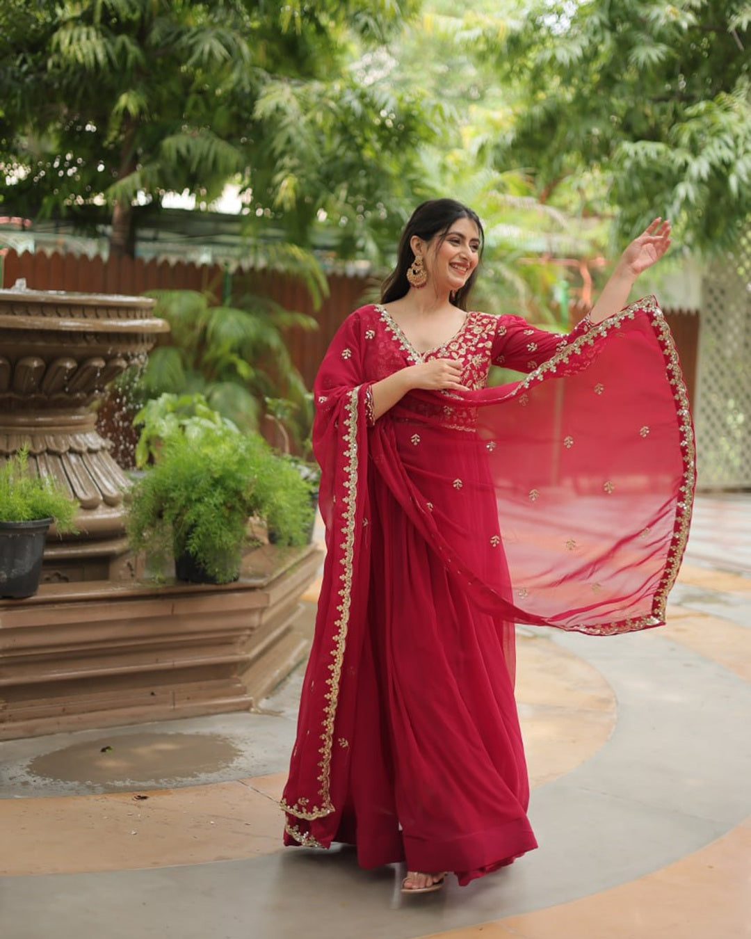 Rani Pink Color Faux Blooming Multi Embroidered Work Gown