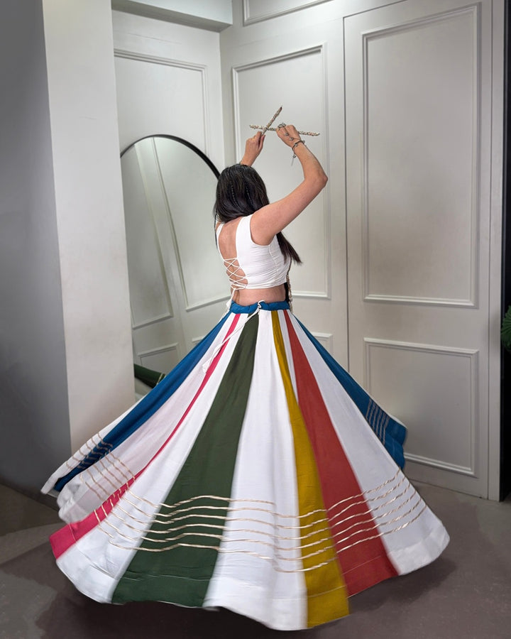 Traditional White Navratri Lehenga Set in Rayon with Cowrie Embellishments