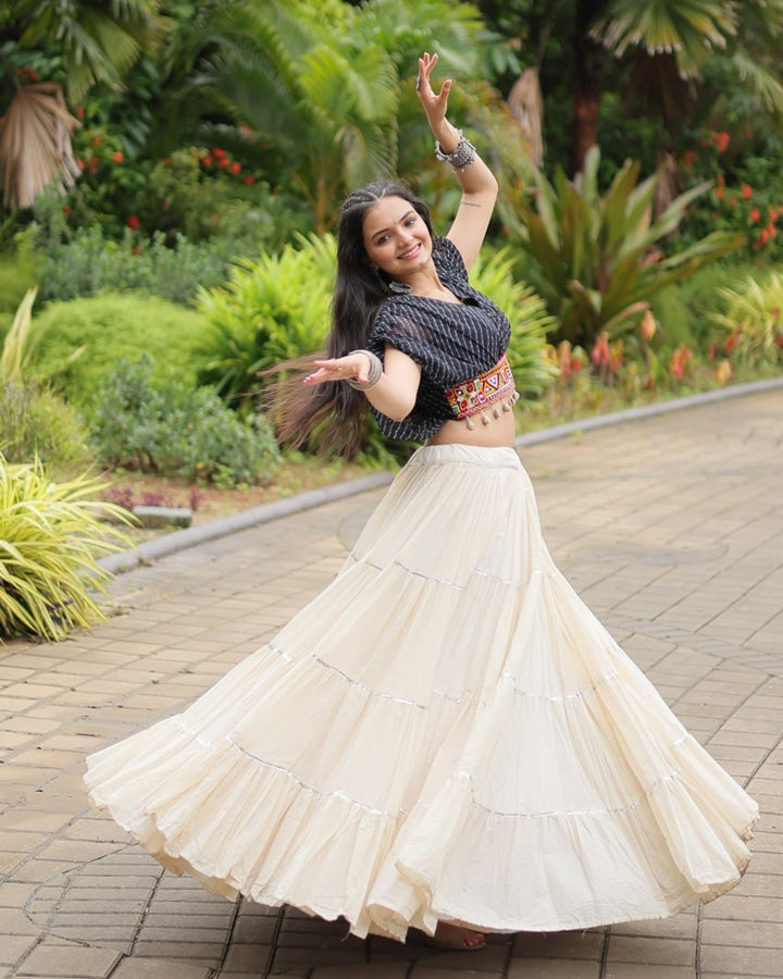 Elegant White Kora Cotton Lehenga Paired with Black Blouse