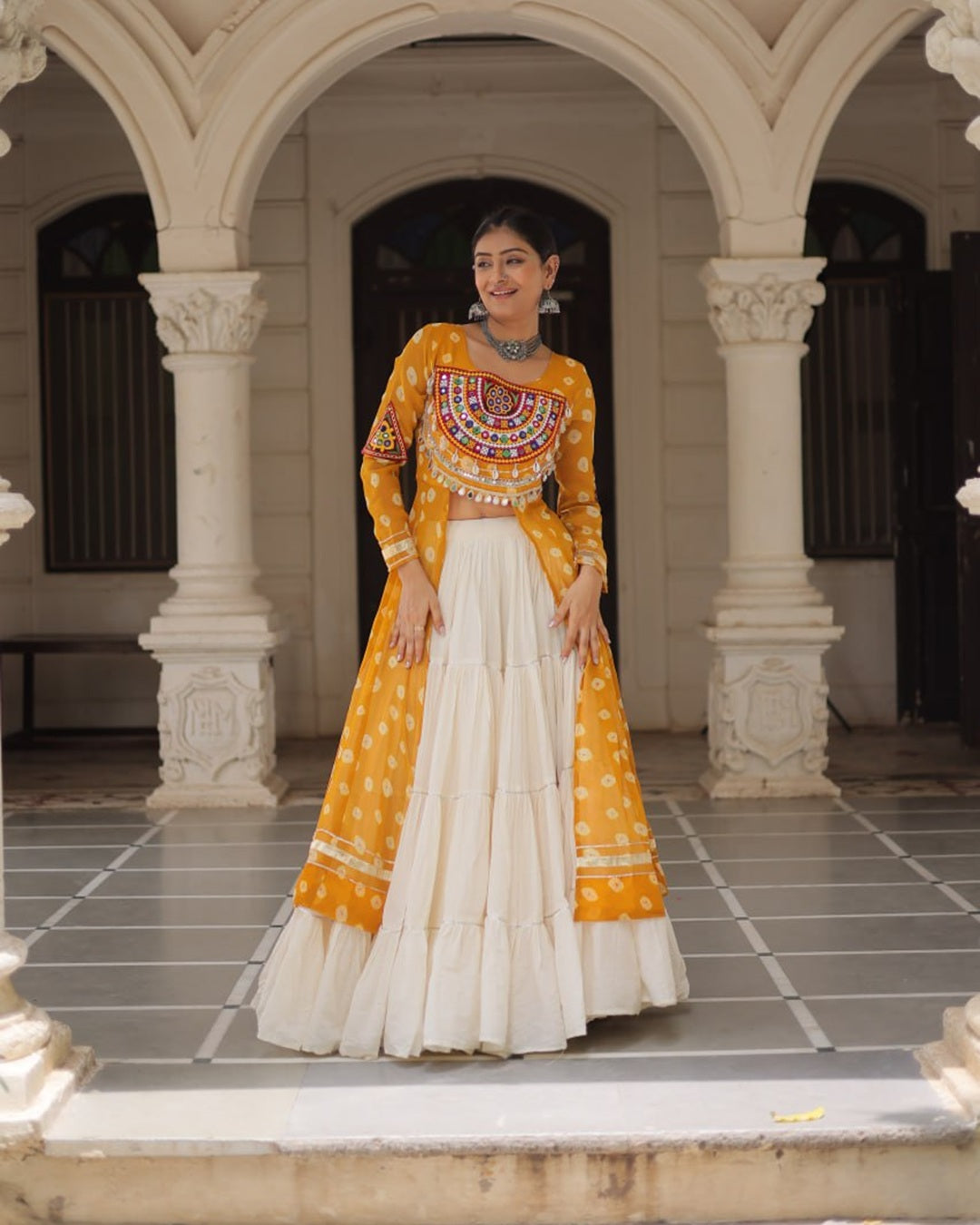 Festive Yellow Bandhani Print Kurti Lehenga Ensemble