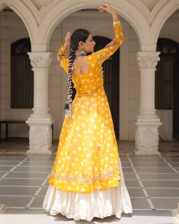 Festive Yellow Bandhani Print Kurti Lehenga Ensemble