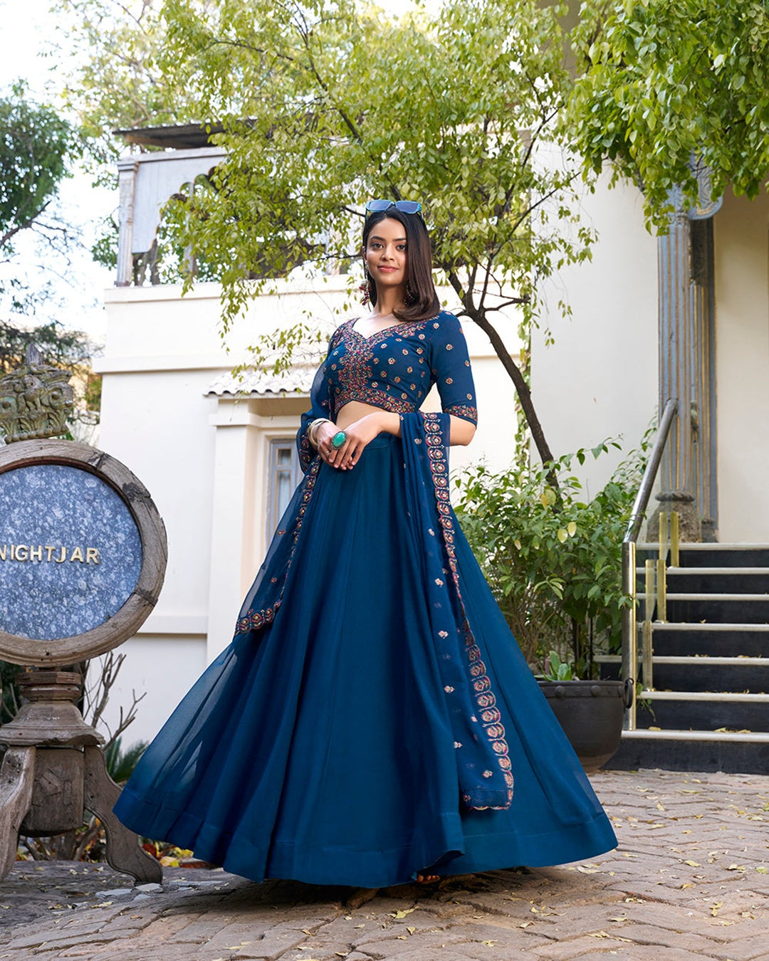 Firozi Color Georgette Embroidered Lehenga Choli